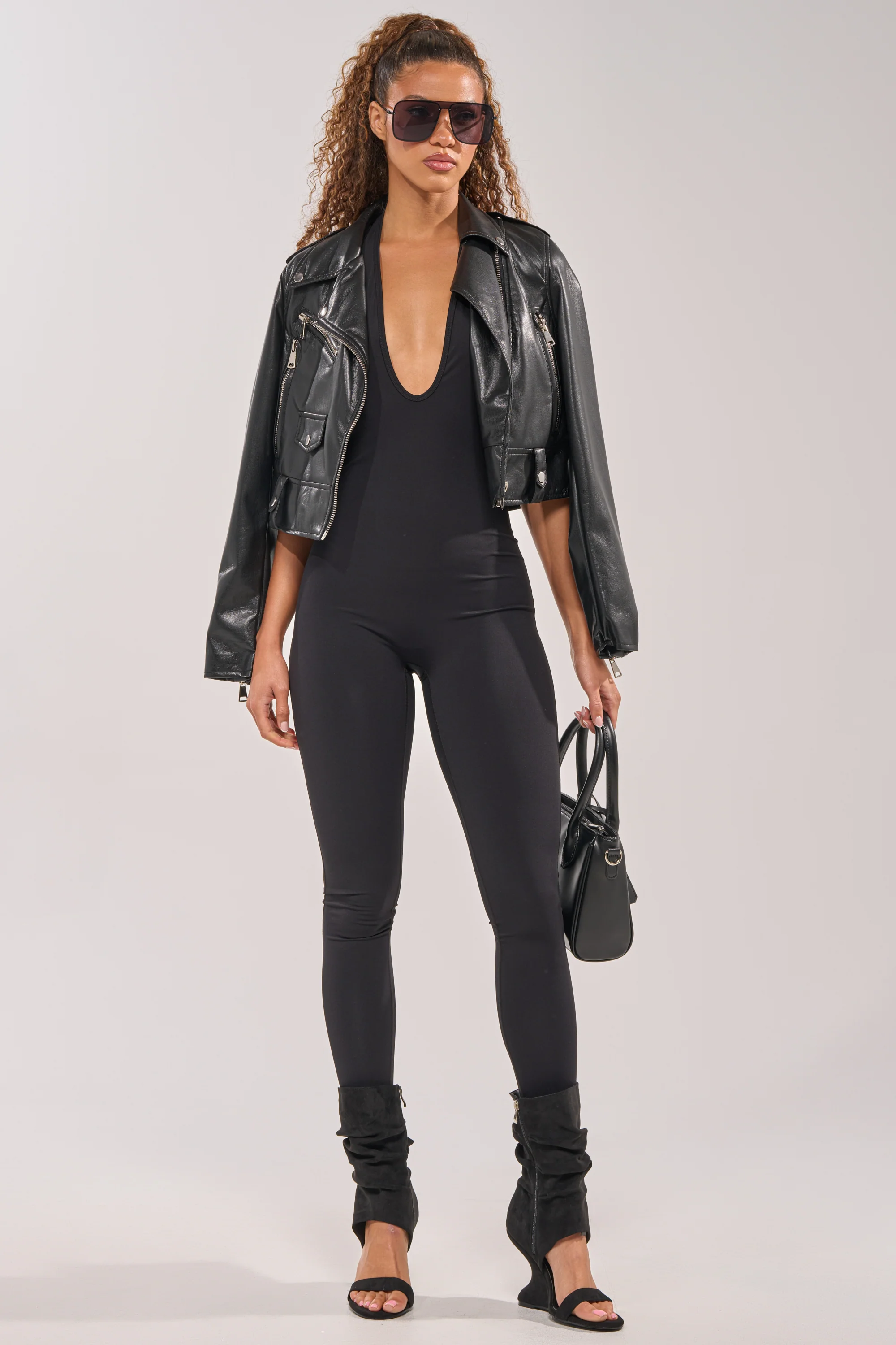 HIGH STANDARDS SLEEVELESS HALTER JUMPSUIT - Akira Wear