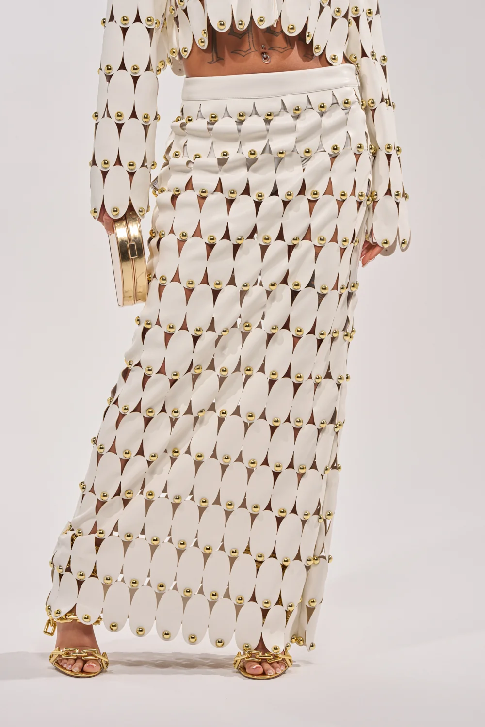 THE SNEAK PEEK STUDDED PU MIDI SKIRT IN WHITE - Akira Wear