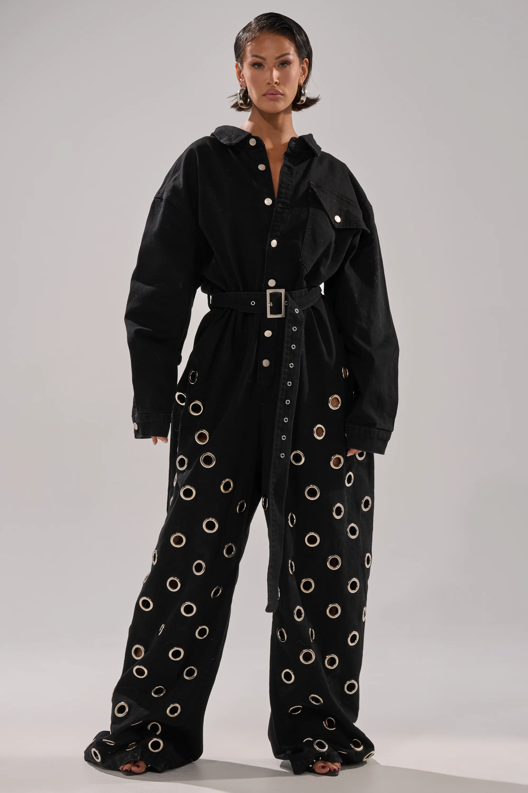 PLAY YOUR CARDS RIGHT DENIM JUMPSUIT WITH GROMMETS - Akira Wear