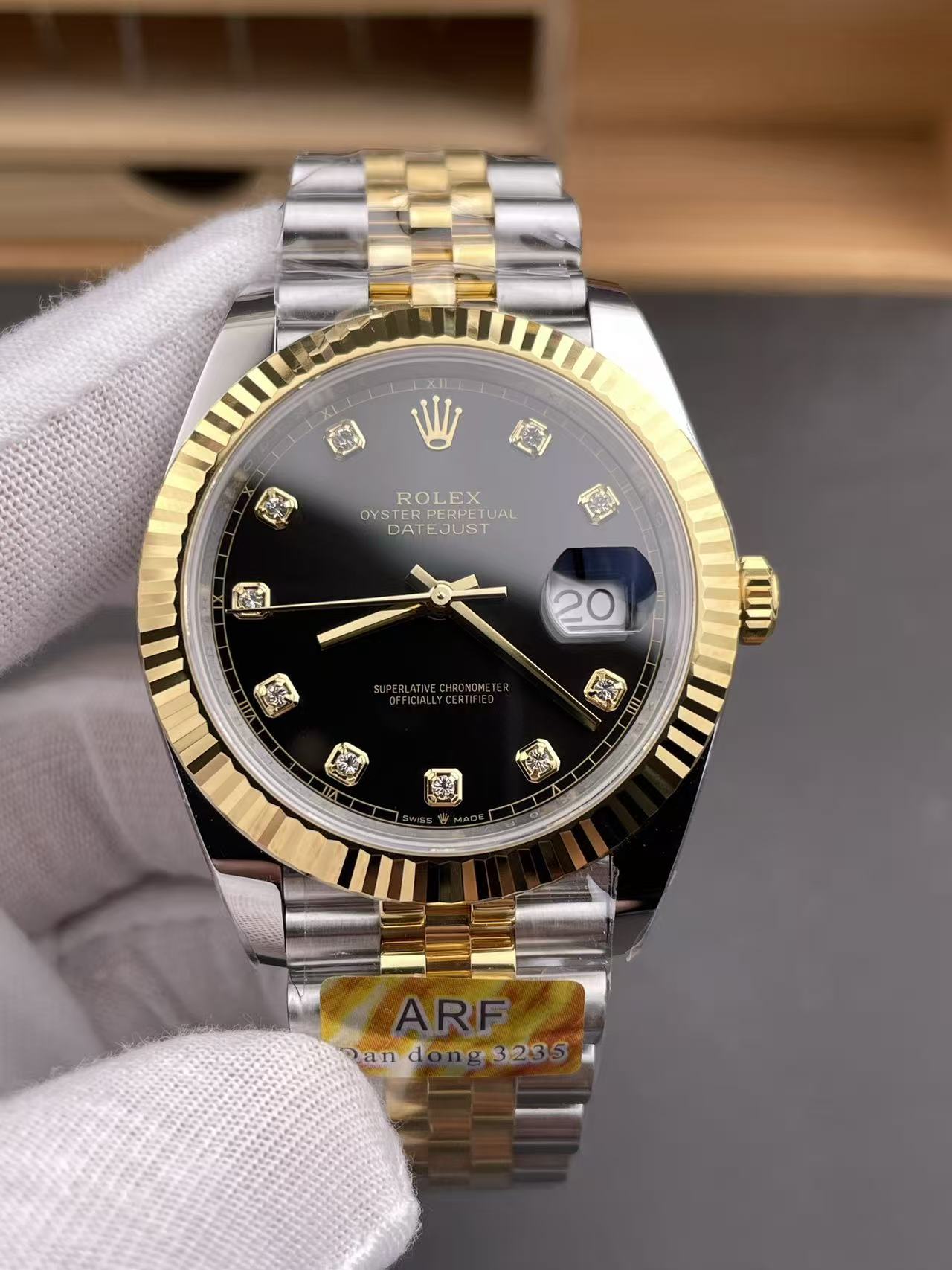 Code No. 11 Rolex Datejust Automatic Watch, Two‑Tone Gold & Steel, Black Dial with Diamond Hour Markers
