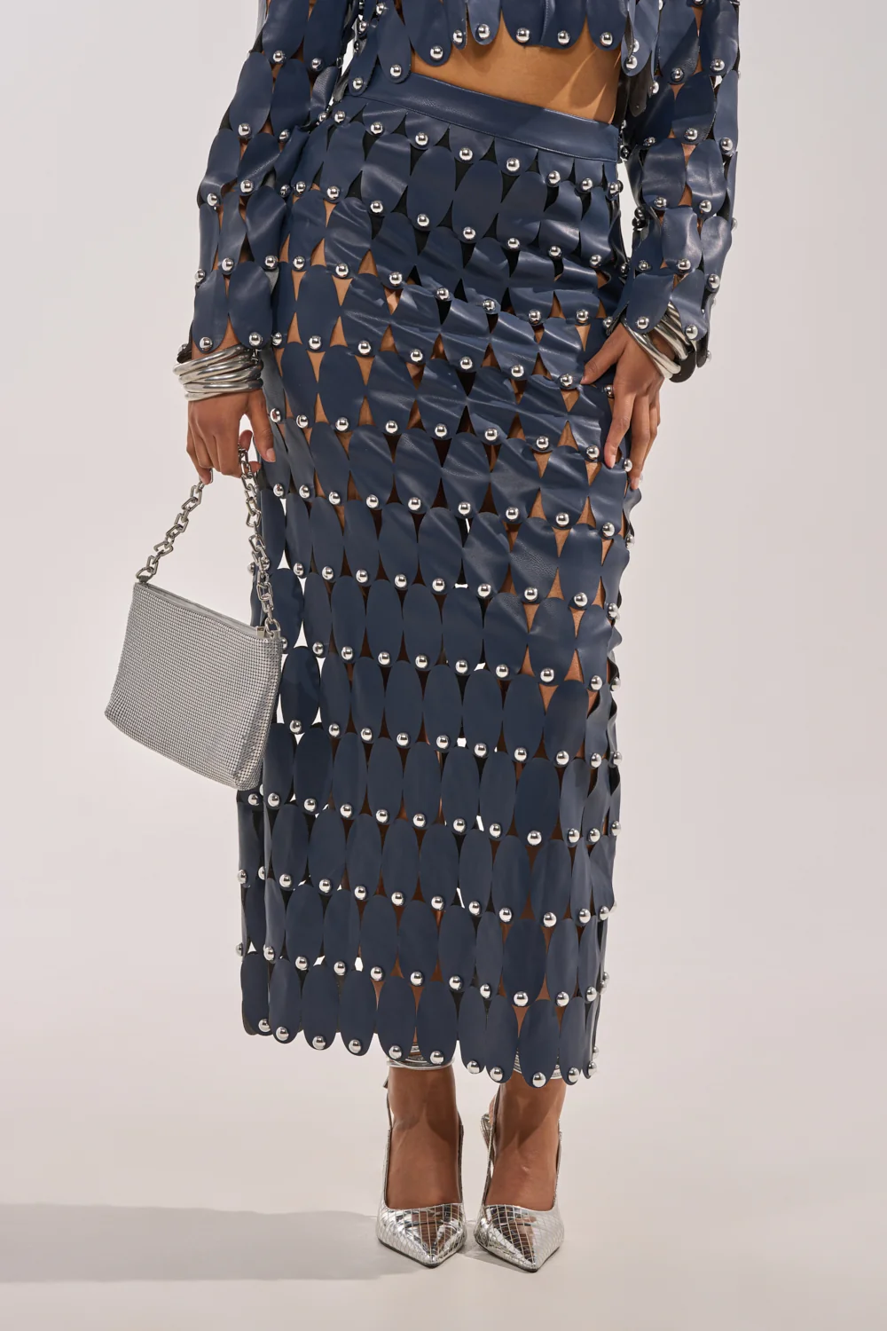 THE SNEAK PEEK STUDDED PU MIDI SKIRT IN NAVY - Akira Wear