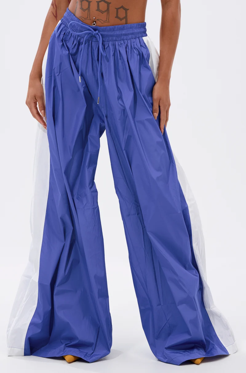 BREAKING THE RULES TRACK PANT IN ROYAL BLUE - Akira Wear