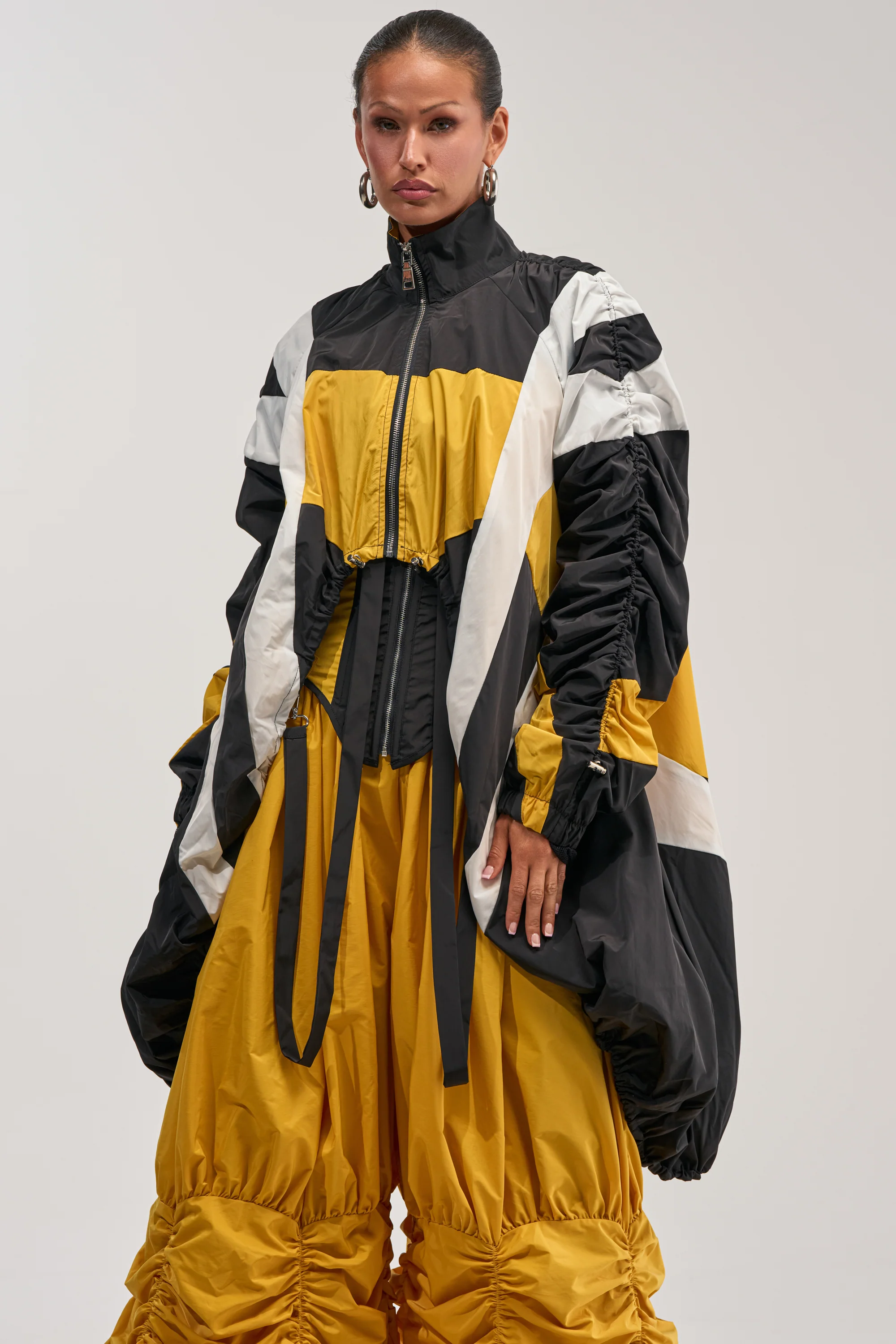 DON'T MIND ME HIGH LOW WINDBREAKER IN YELLOW - Akira Wear