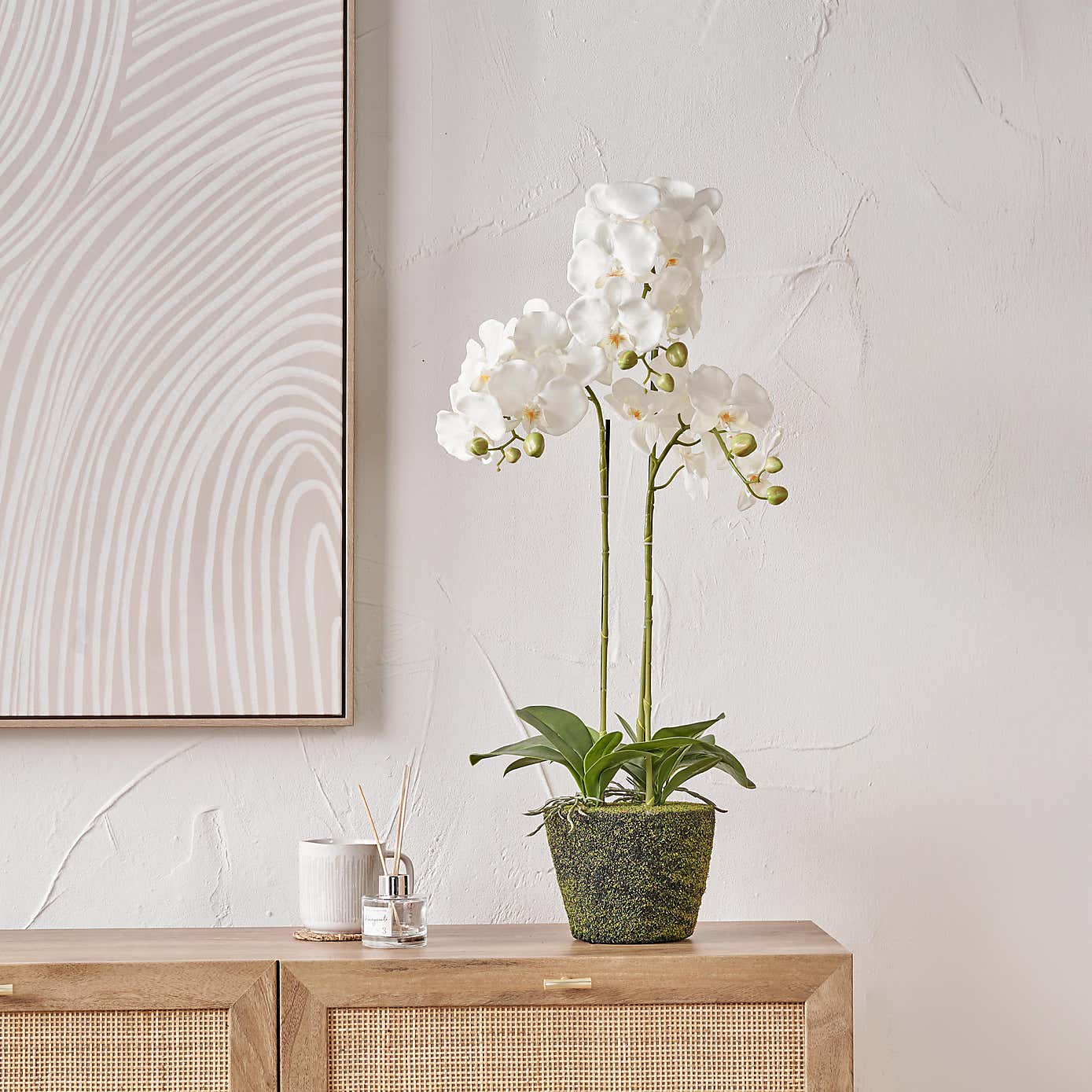 Artificial White Orchid in Moss Plant Pot