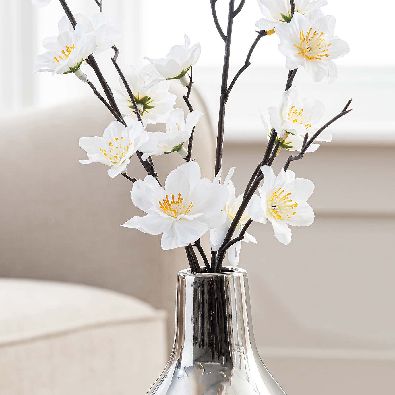 Artificial Cream Blossom in Silver Metallic Vase