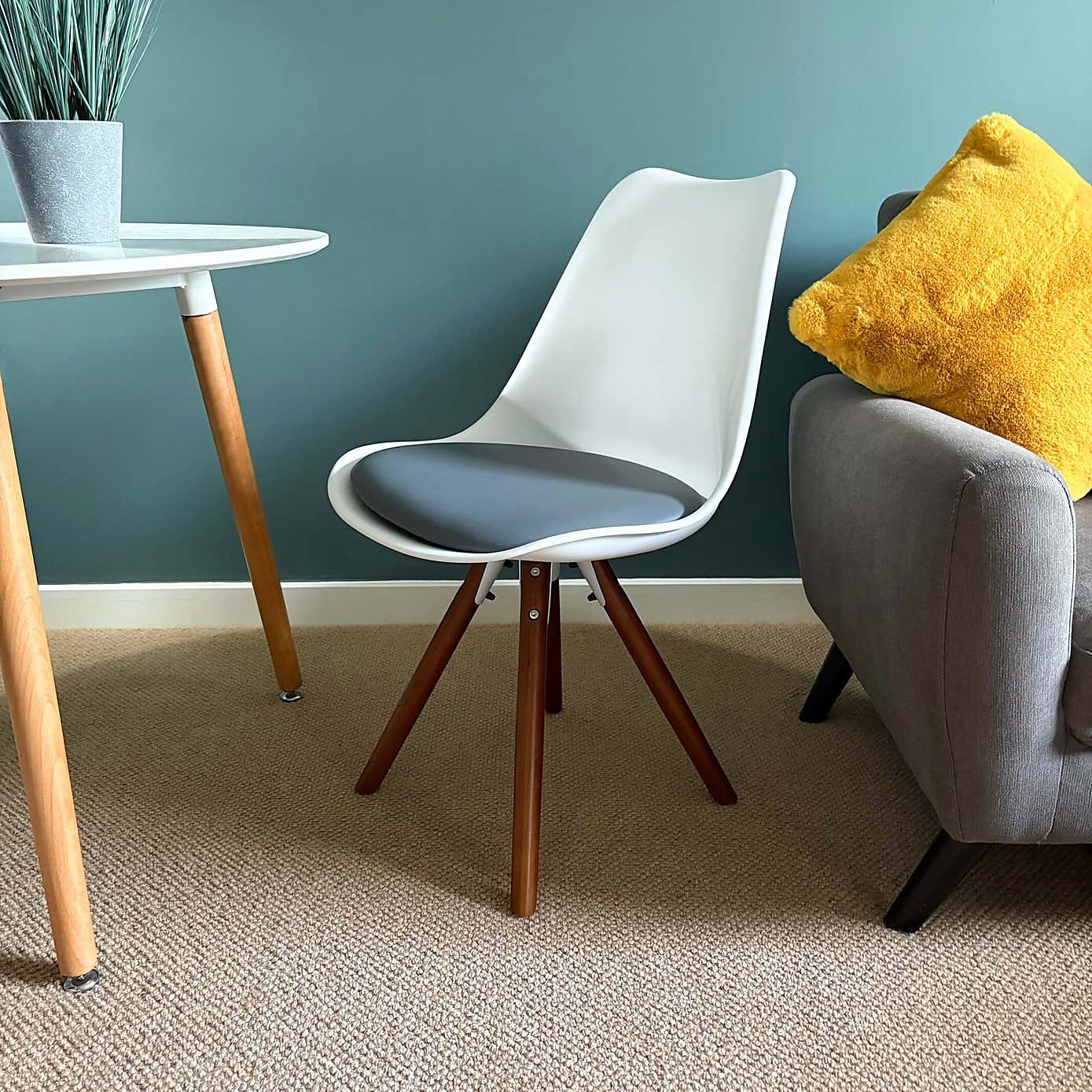 Fusion Living Soho White Plastic Dining Chair with Pyramid Legs