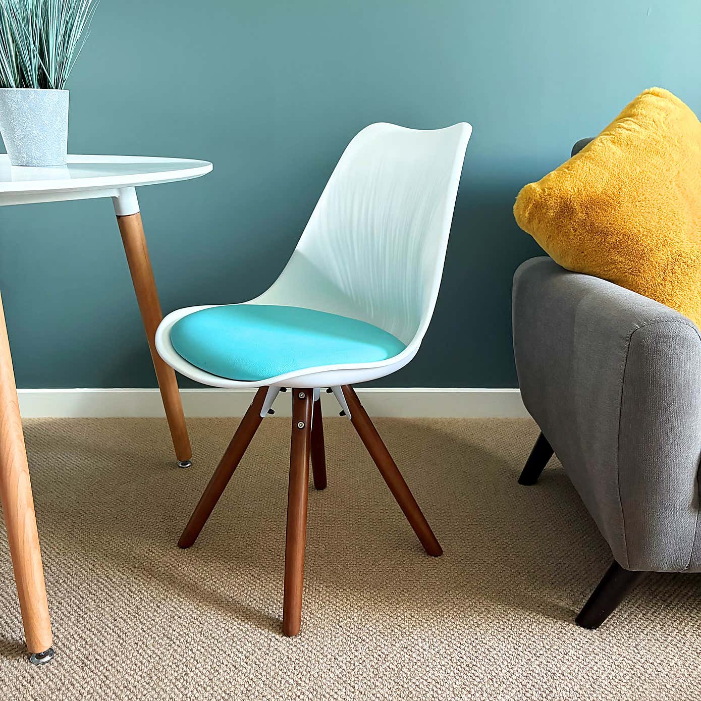 Fusion Living Soho White Plastic Dining Chair with Pyramid Legs