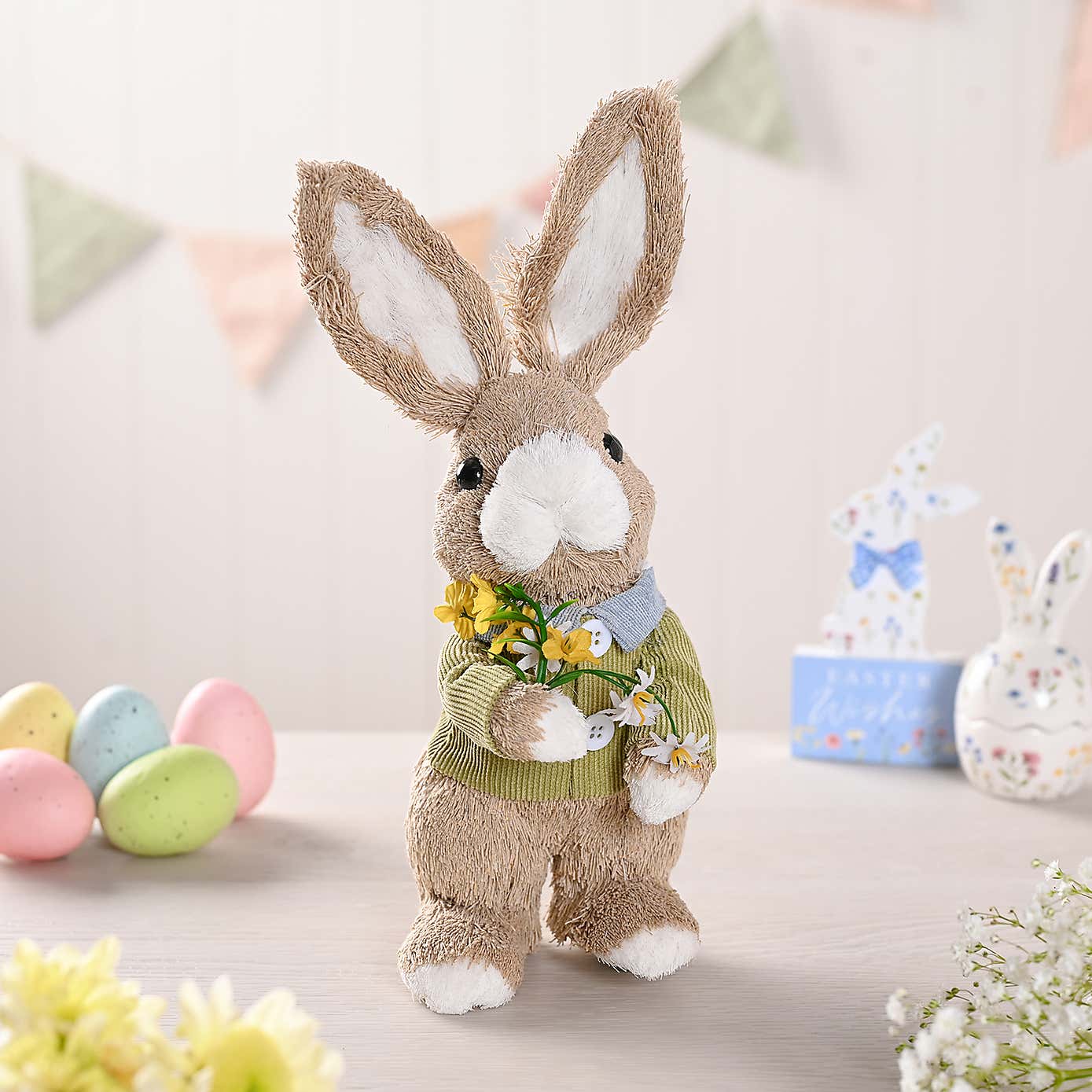 Eggs traordinary Gifting Company Bunny Holding Flowers Decoration
