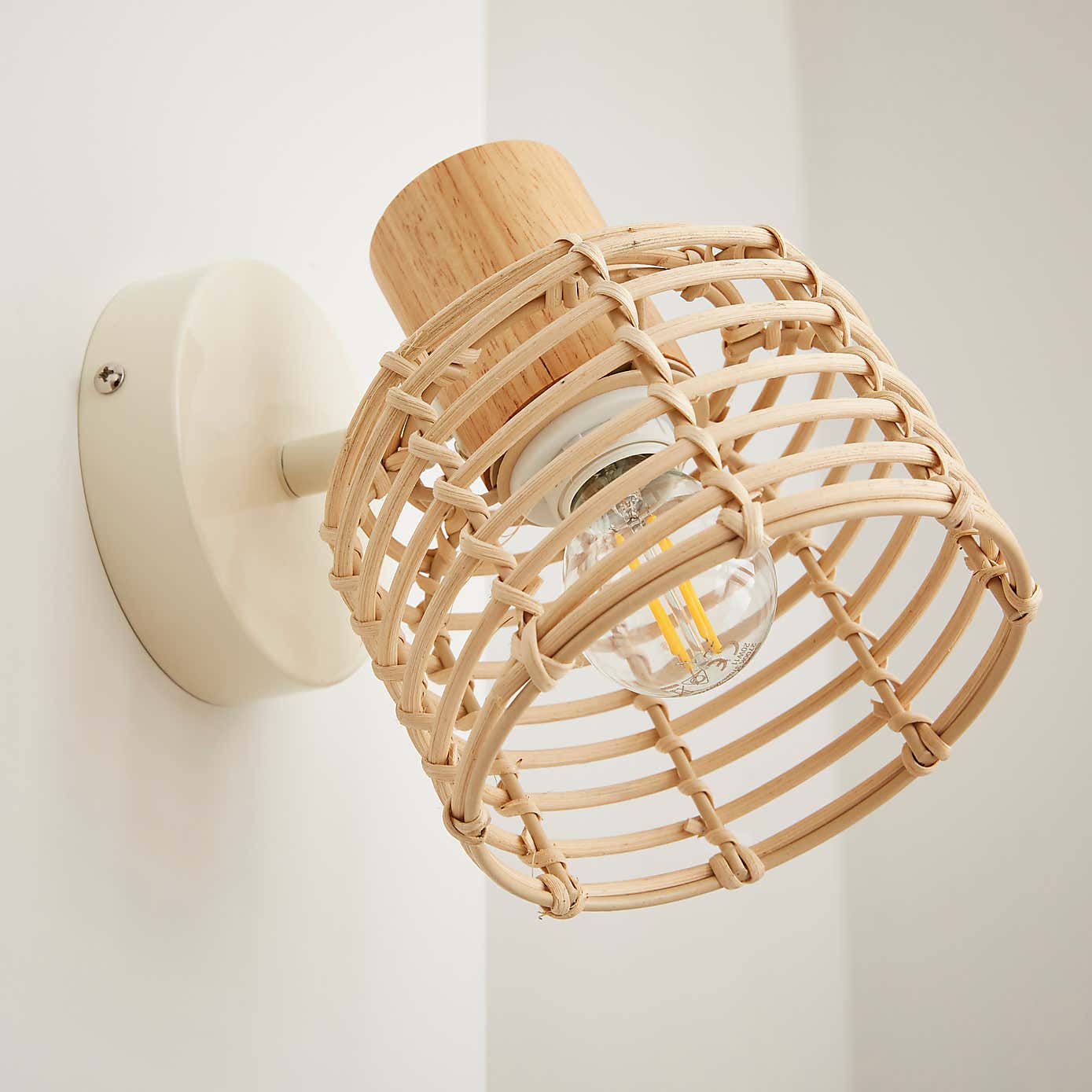 Emil Rattan Adjustable Wall Light