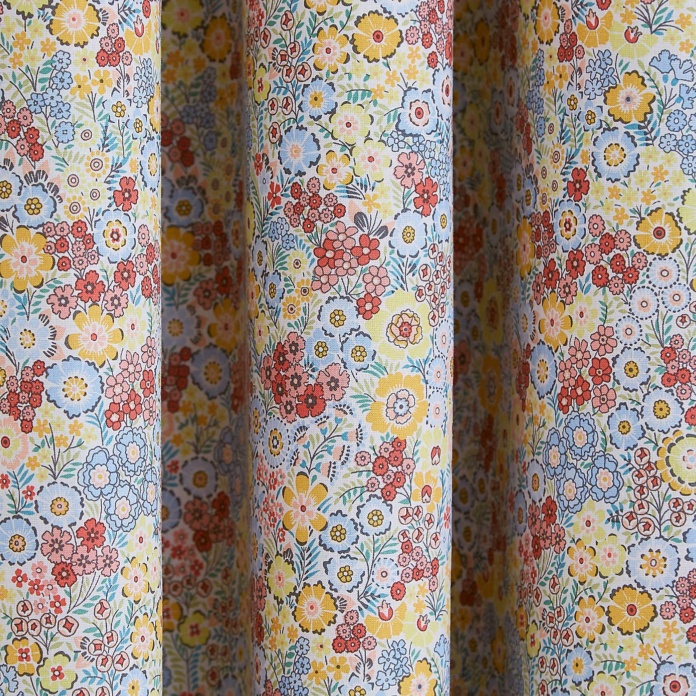 Hannah Retro Ditsy Blackout Eyelet Curtains