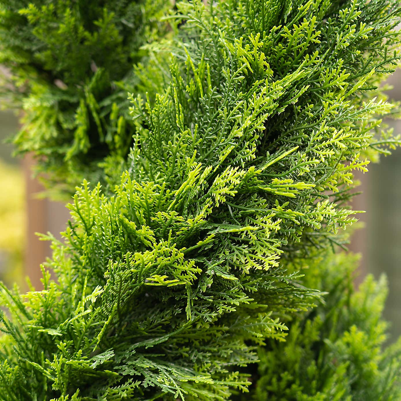 Artificial Twisted Cedar Topiary in Stone Pot
