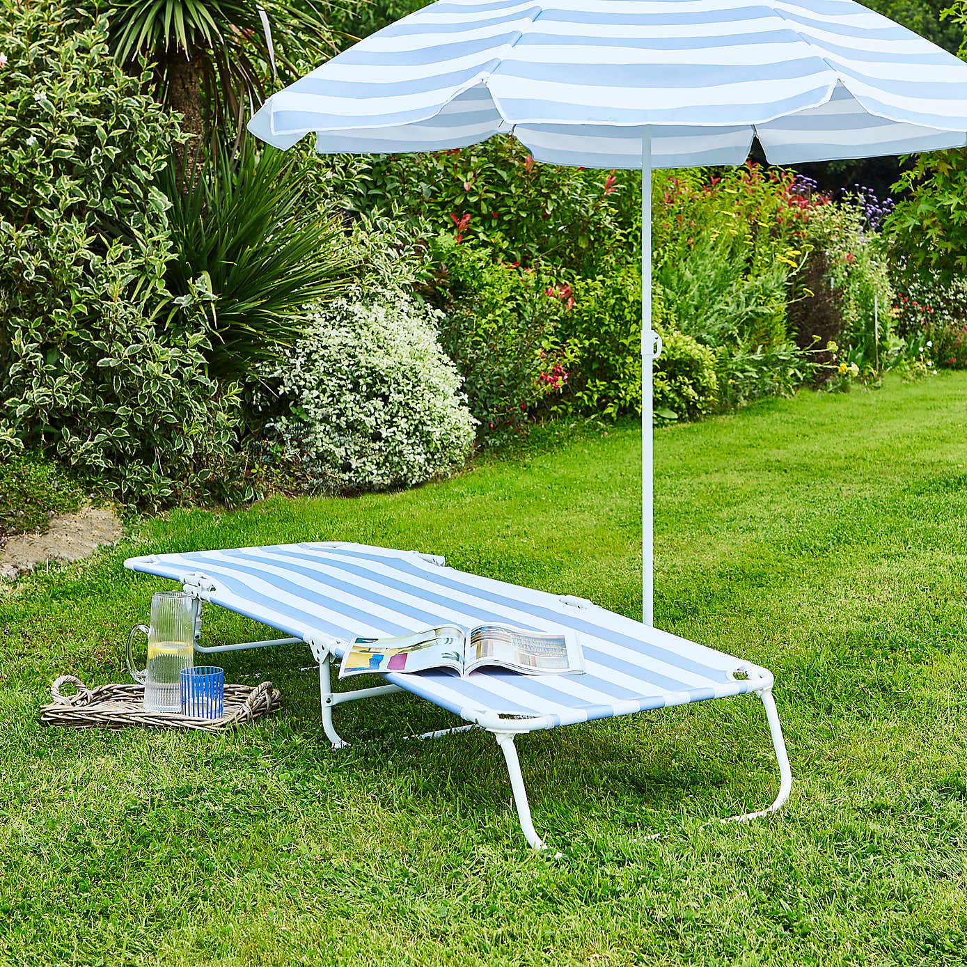 Blue and White Folding Lounger