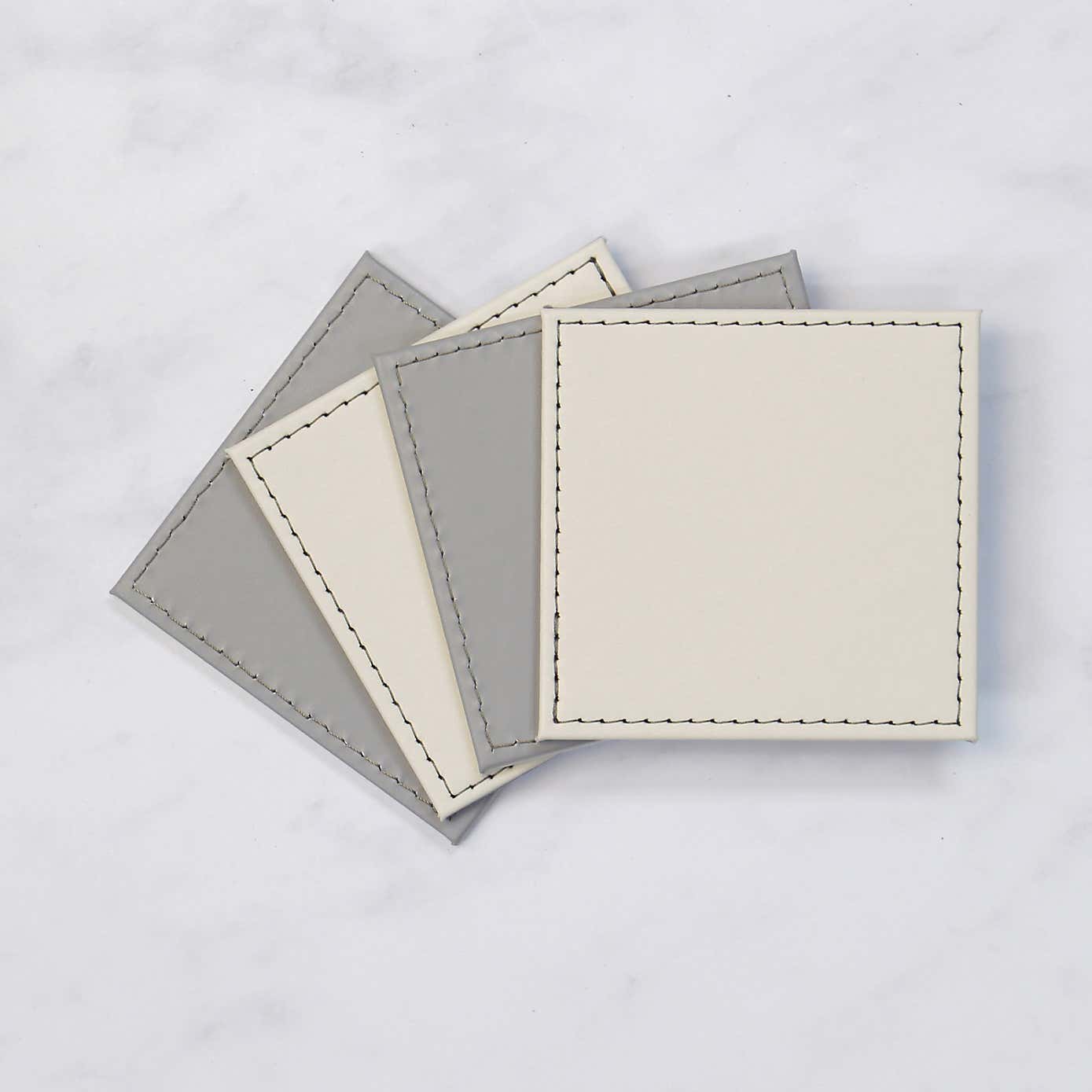 Set of 4 Reversible Cream & Grey Faux Leather Coasters