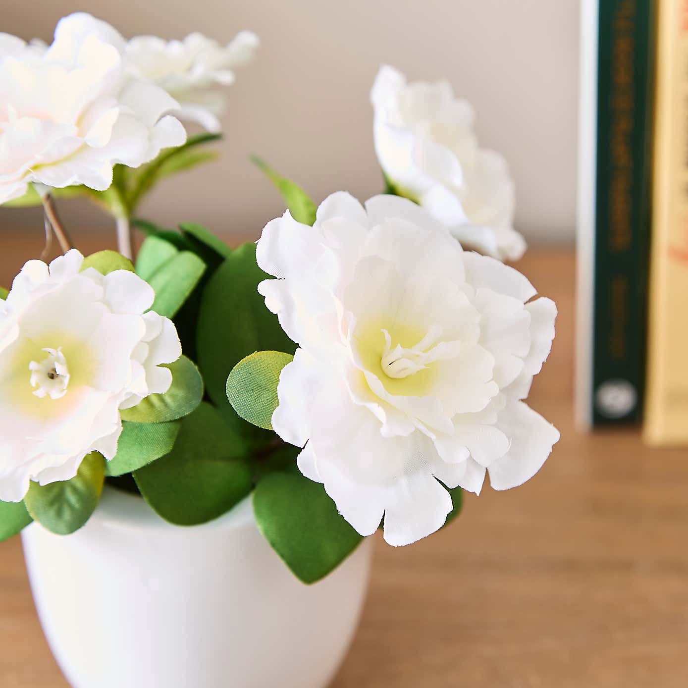 Artificial Blossom Floral in White Ceramic Plant Pot