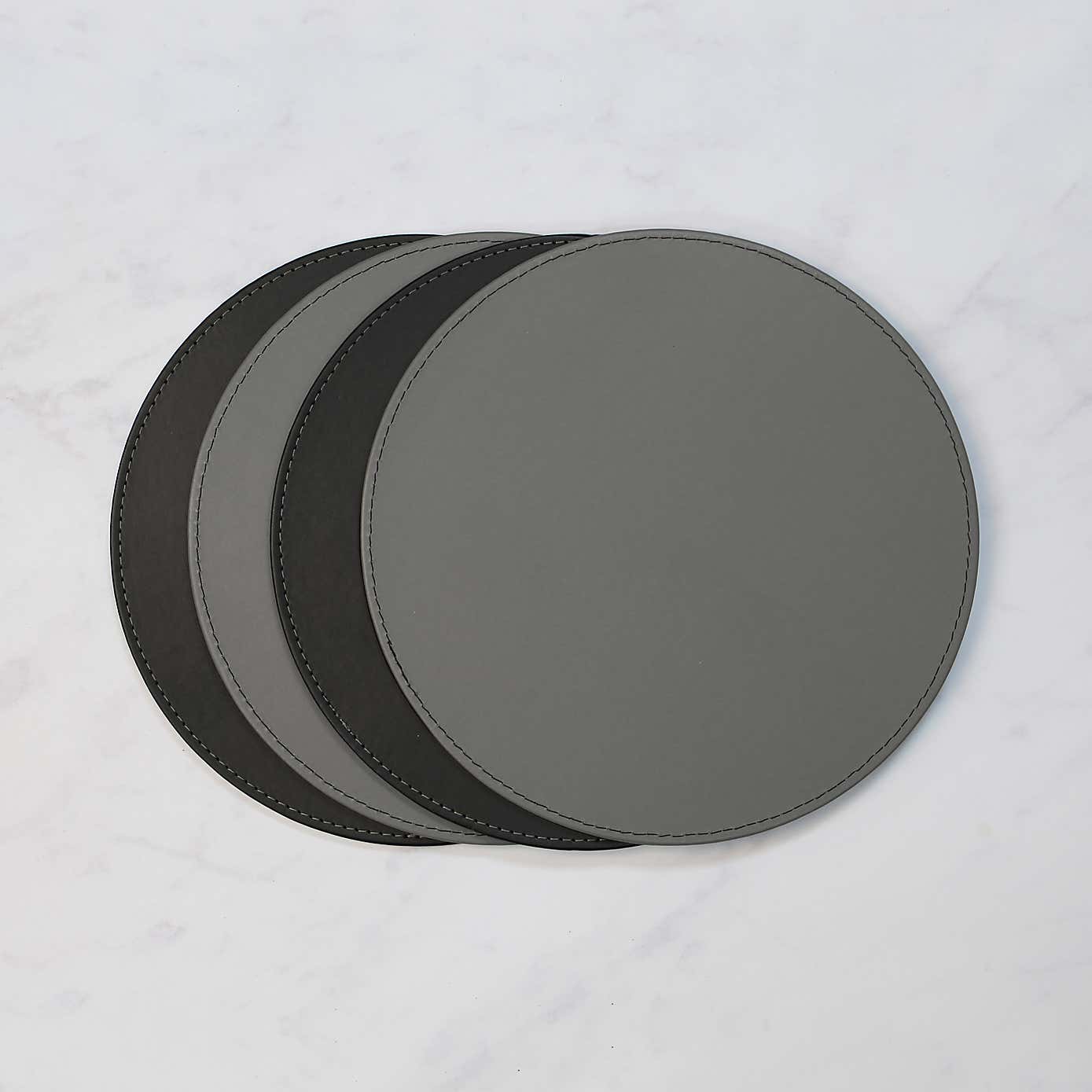 Set of 4 Black & Grey Faux Leather Reversible Round Placemats