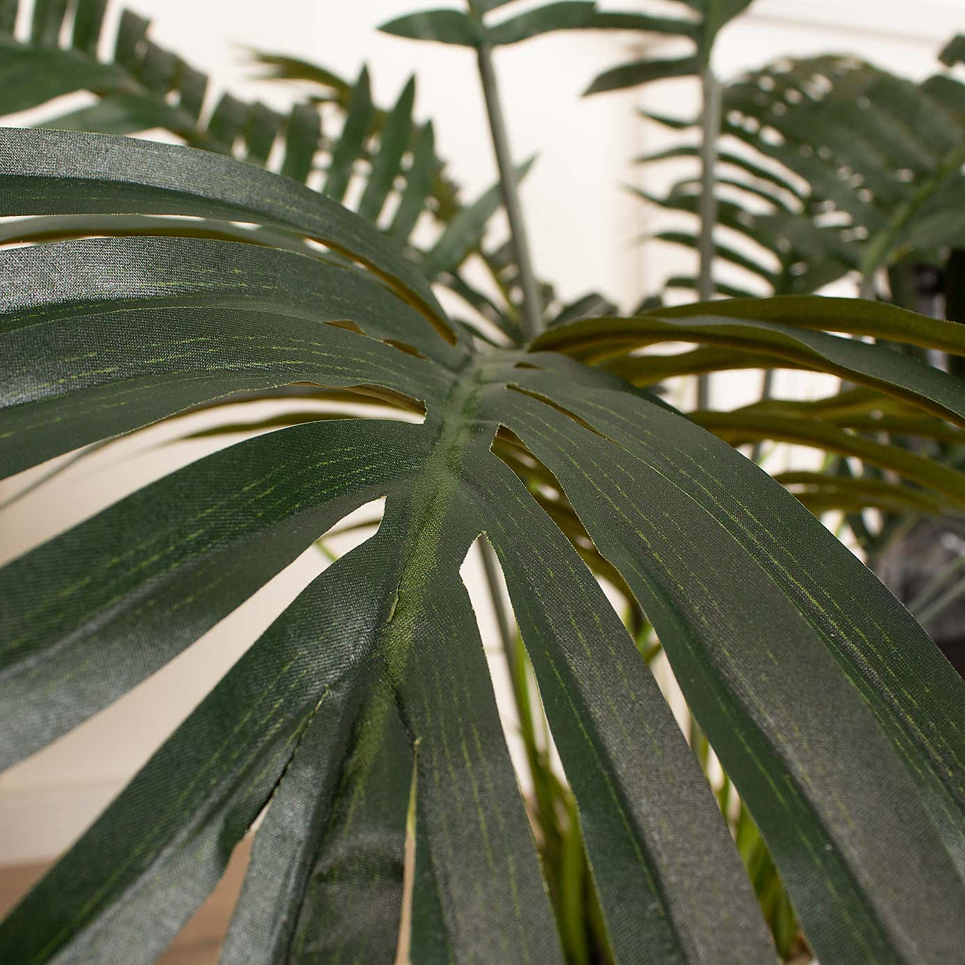 Artificial Palm Tree in White Ceramic Plant Pot