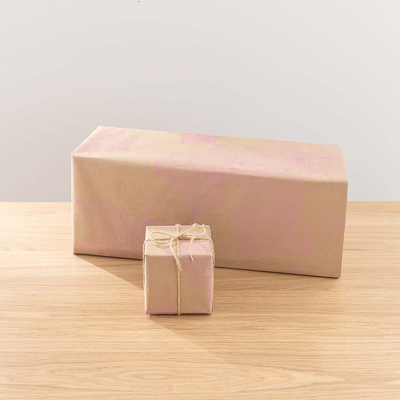 White Rose & Eucalyptus Floral Arrangement in Ribbed Glass Vase with Soft Amber & Pine Candle