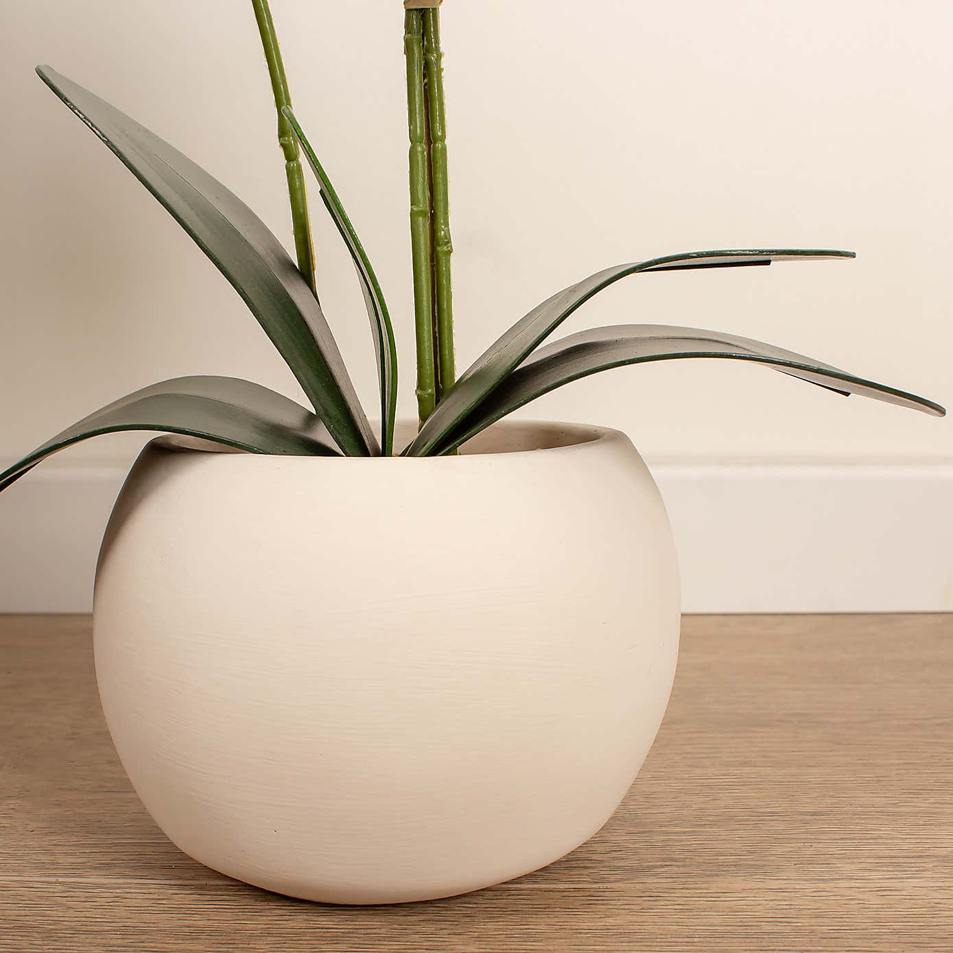 Artificial White Phalaenopsis Orchid in Beige Ceramic Plant Pot