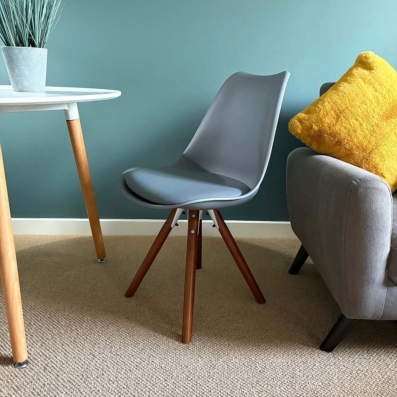 Fusion Living Soho Plastic Dining Chair with Pyramid Legs