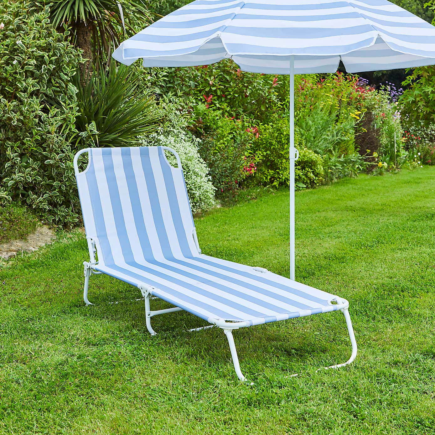 Blue and White Folding Lounger