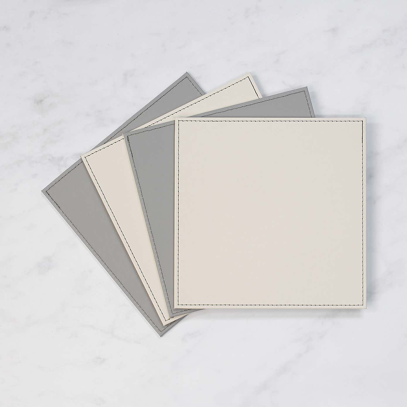 Set of 4 Reversible Cream & Grey Faux Leather Placemats