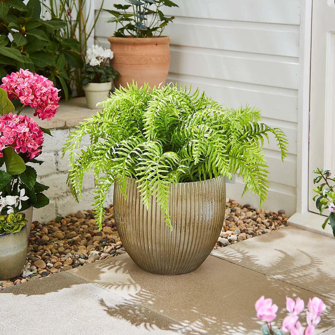 Artificial Fern in Ribbed Plant Pot