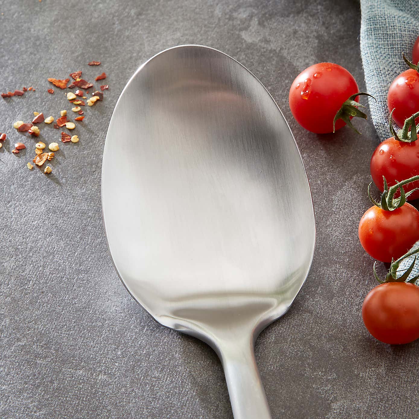 Solid spoon with Soft Grip Handle