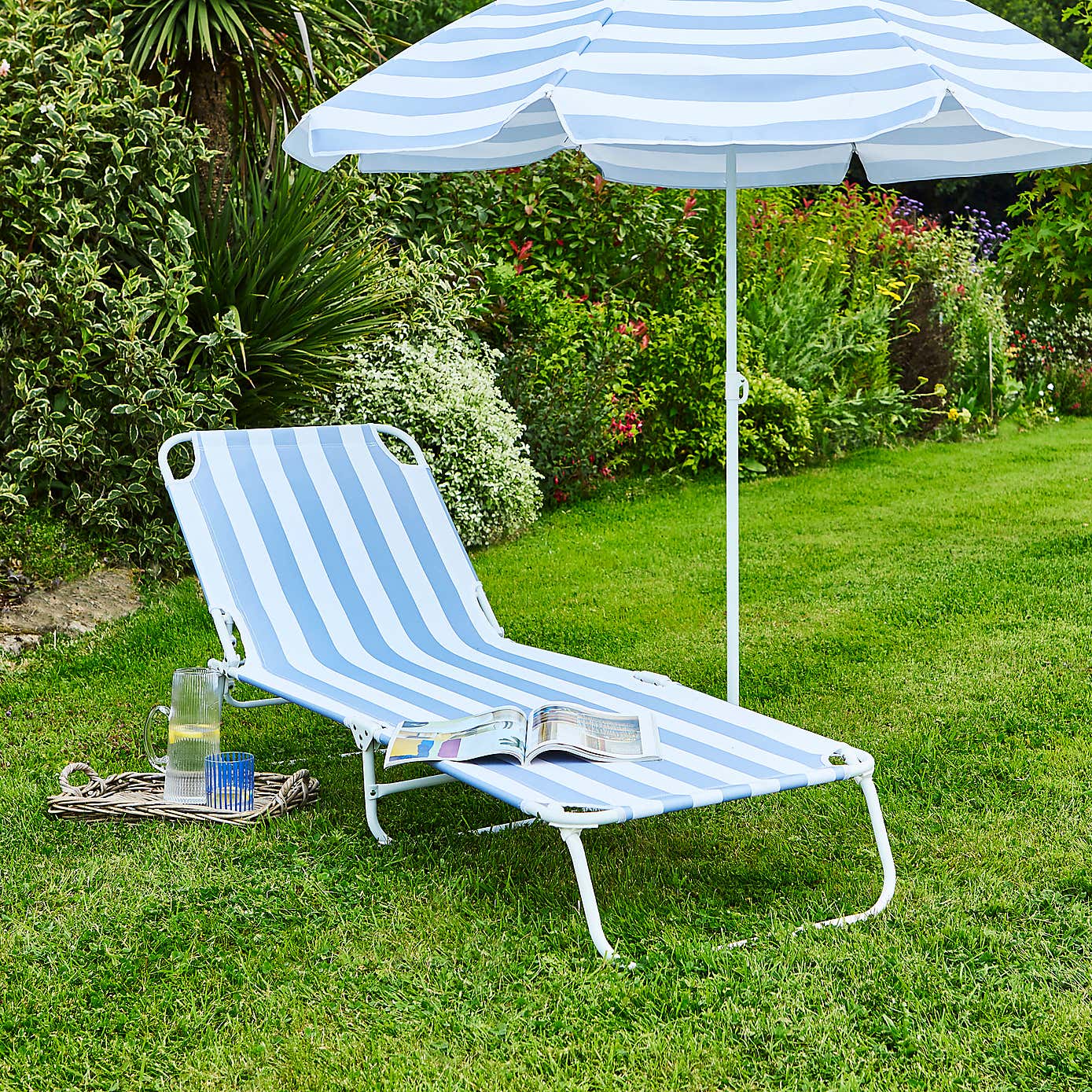 Blue and White Folding Lounger