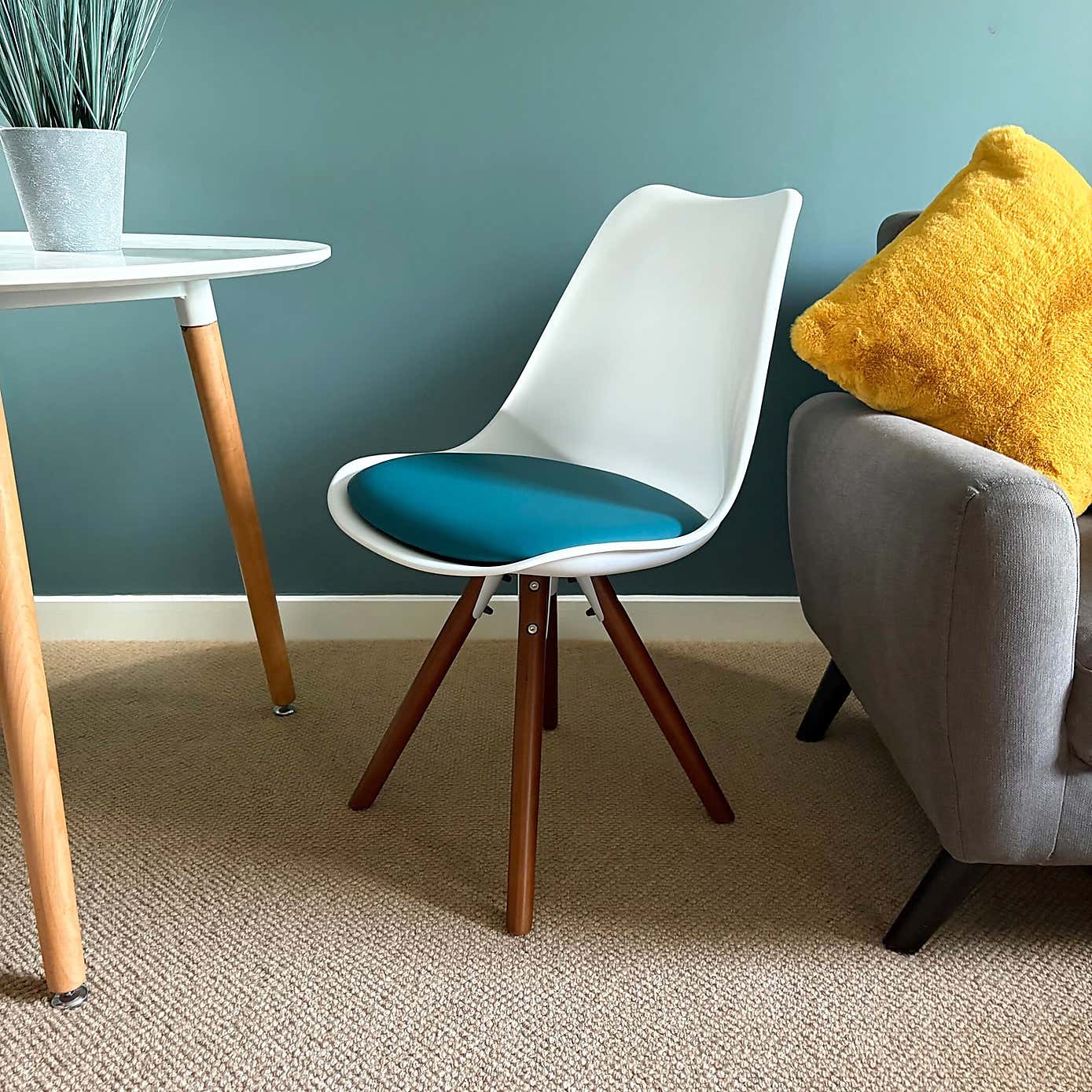 Fusion Living Soho White Plastic Dining Chair with Pyramid Legs