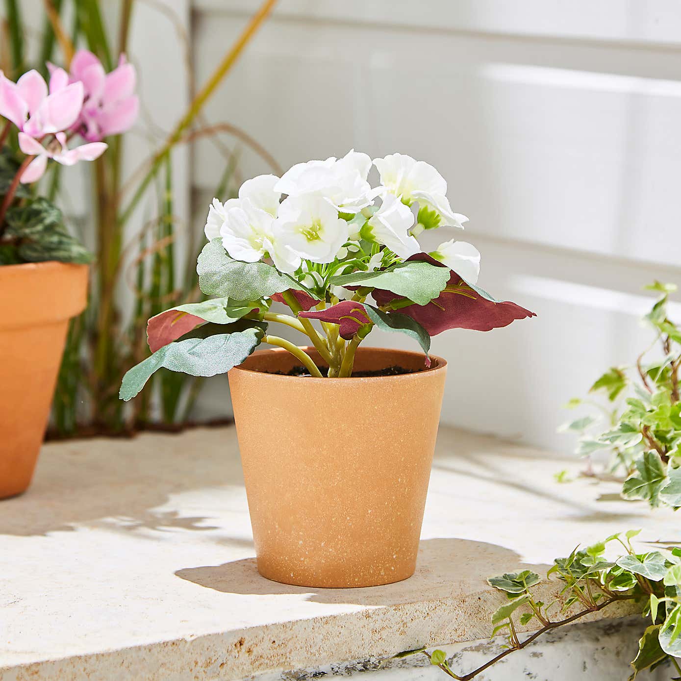 Artificial Geranium in Plant Pot