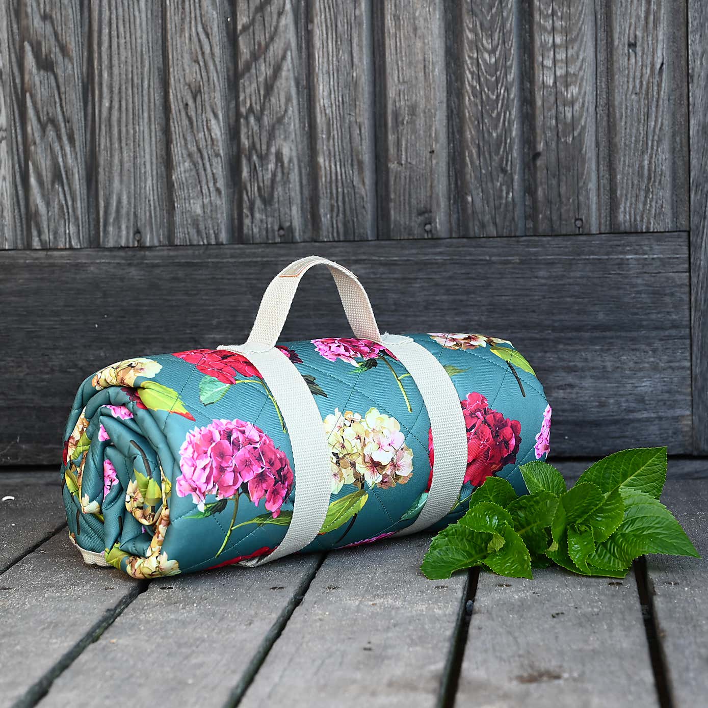 Navigate Sarah Kelleher Teal Rose Print Quilted Picnic Blanket