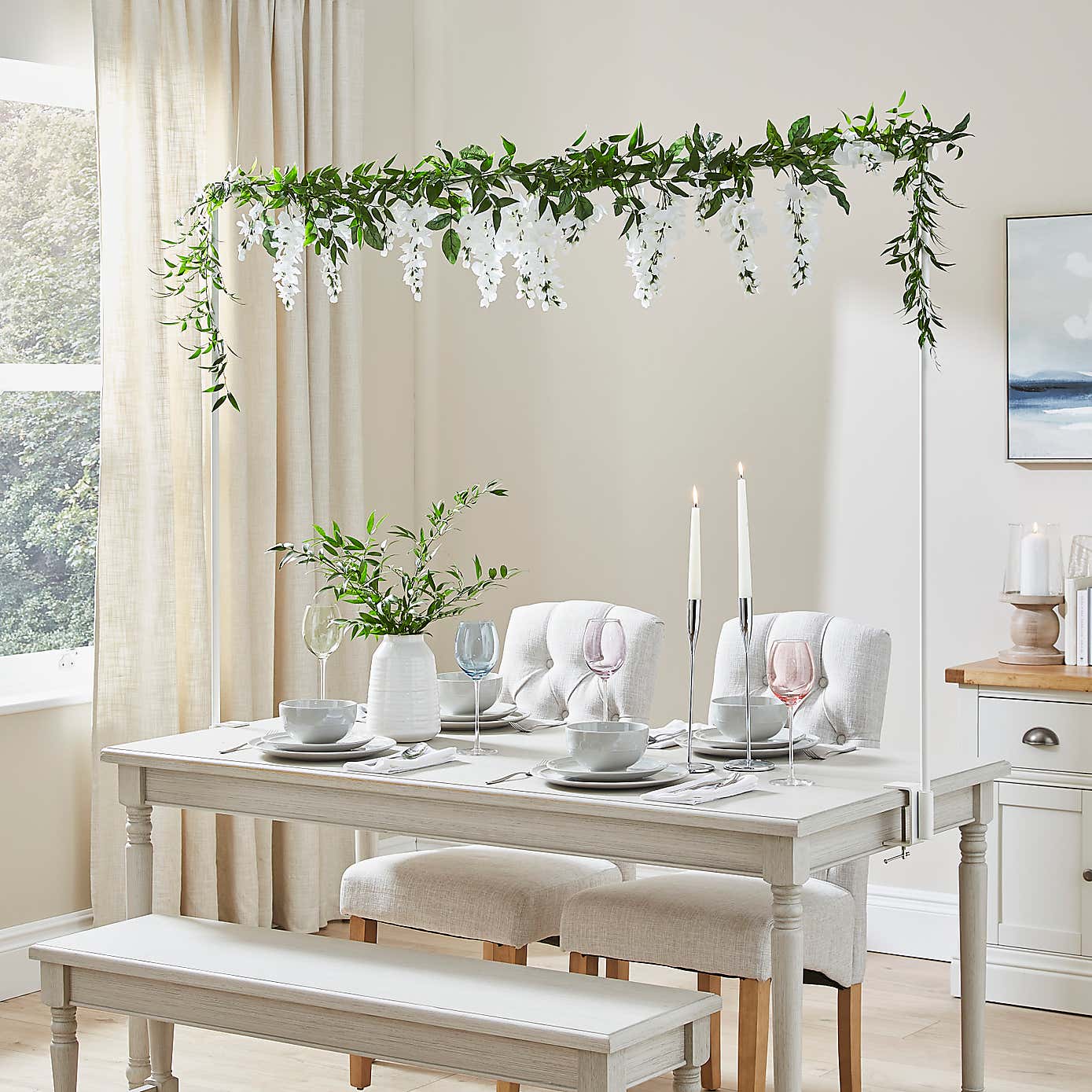 Artificial White Hanging Plan Over Table Display