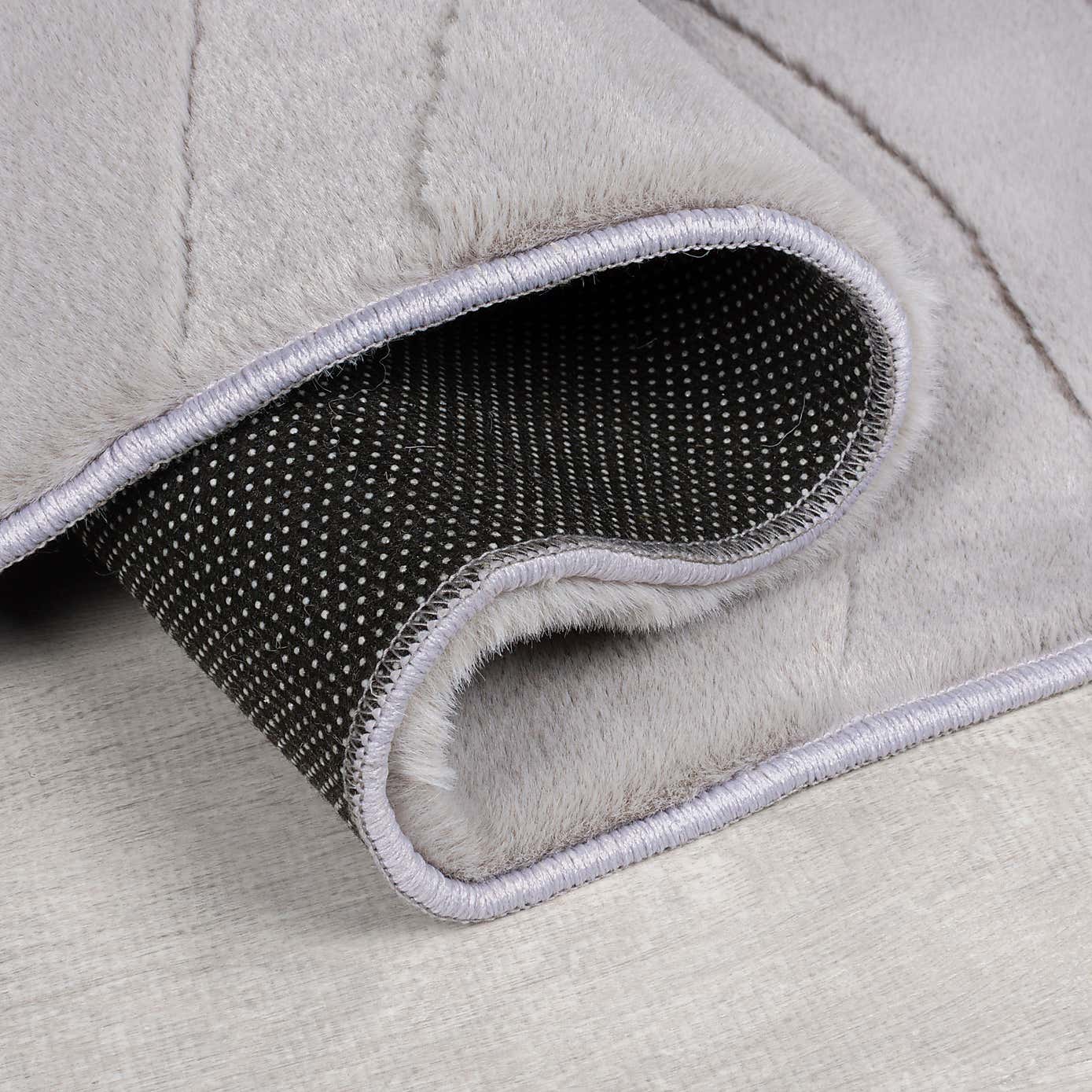 Neve Abstract Faux Fur Wave Rug