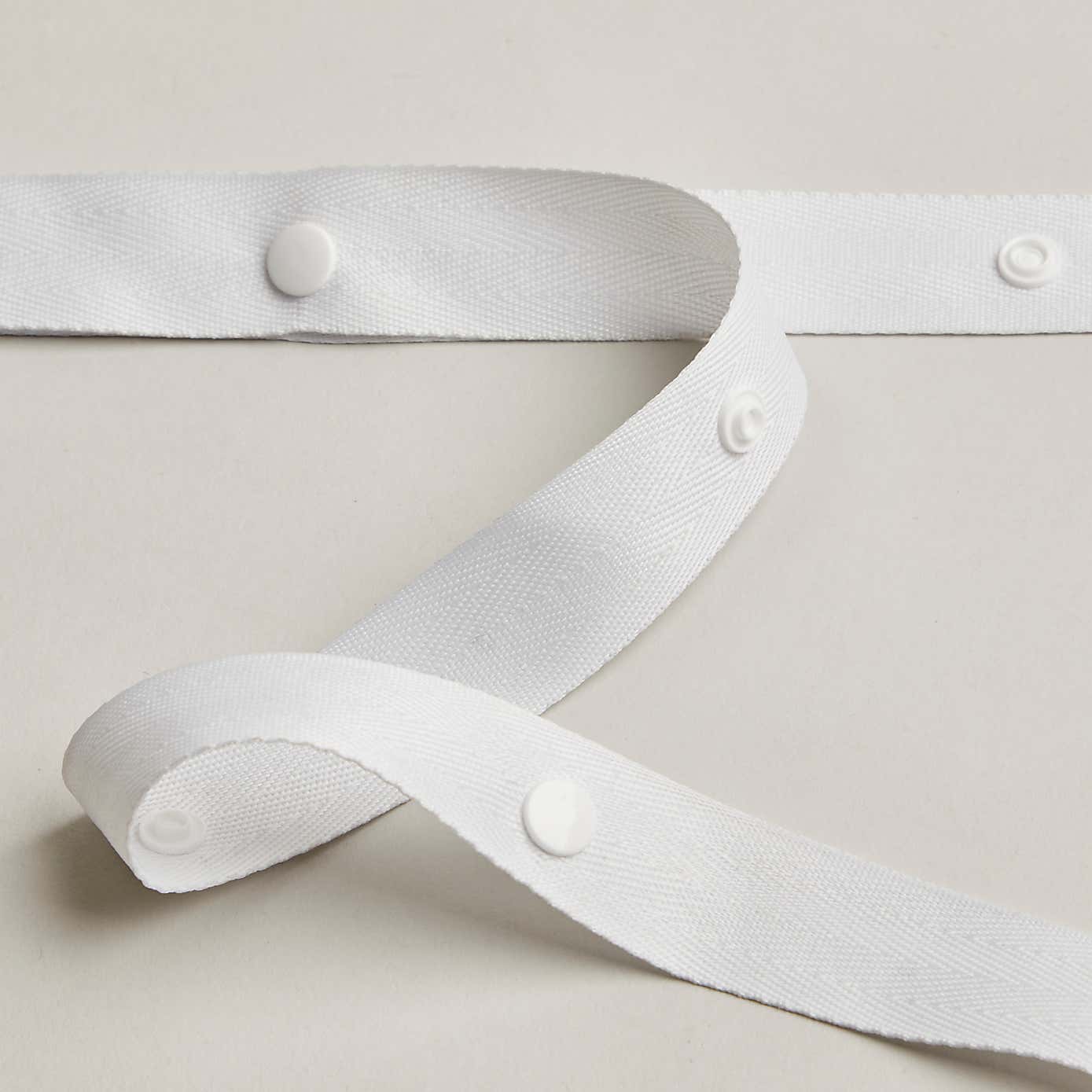 By The Metre Polyester Tape 25mm White Poppers