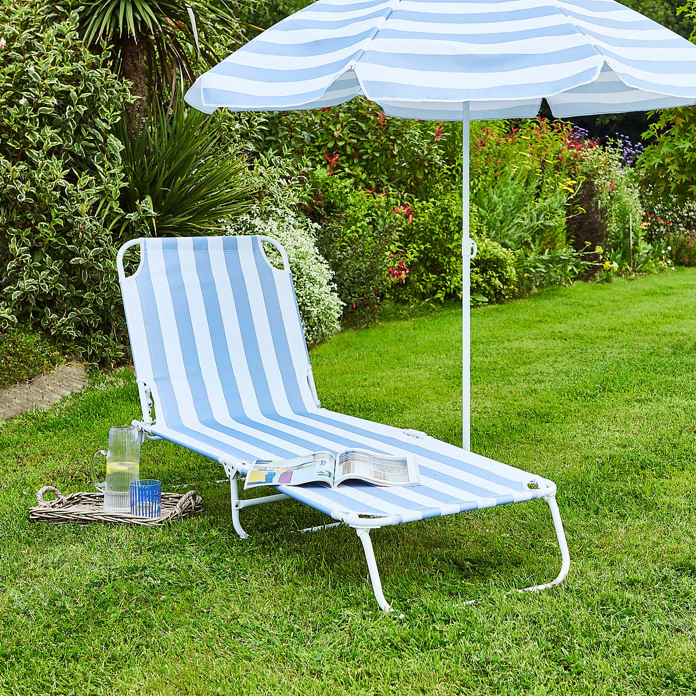 Blue and White Folding Lounger