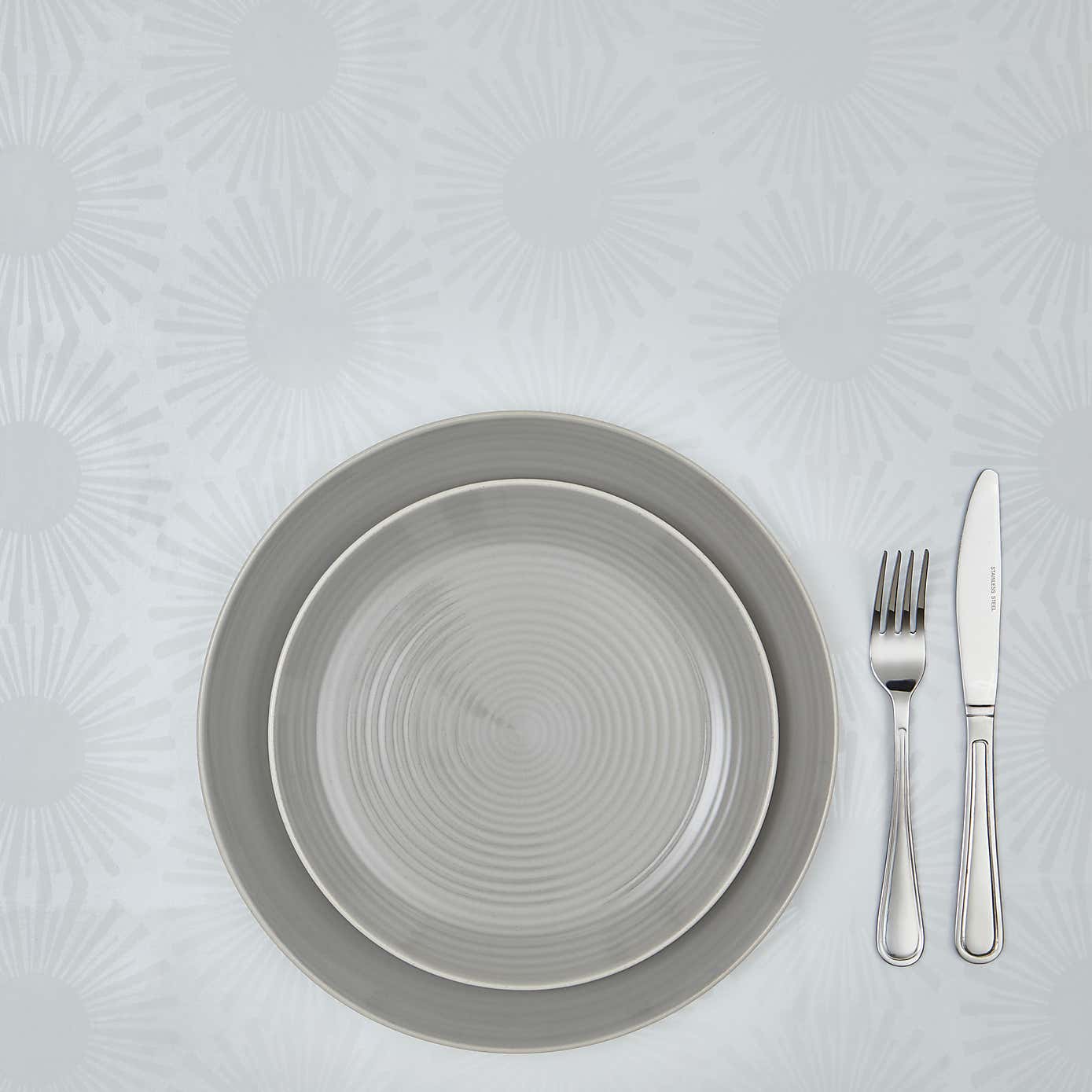 By the Metre Sunburst White PVC