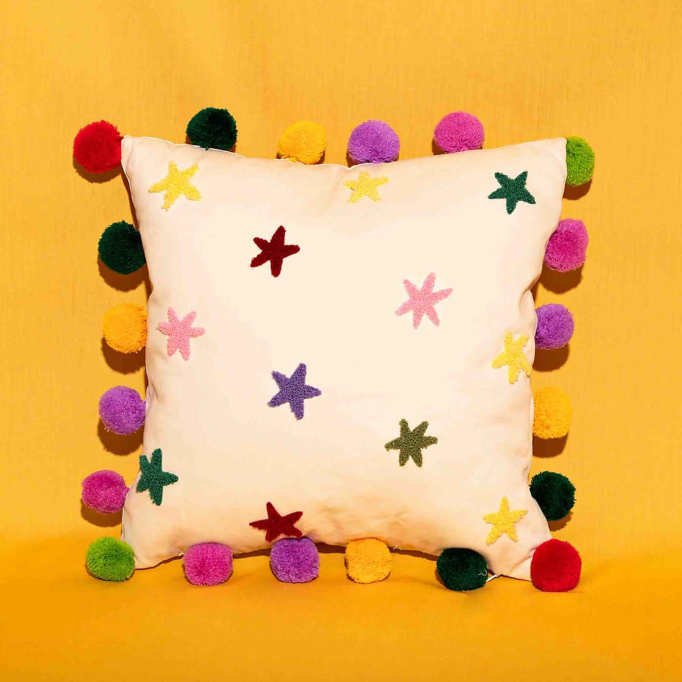 Raspberry Blossom Tufted Stars Cushion with Pom Poms