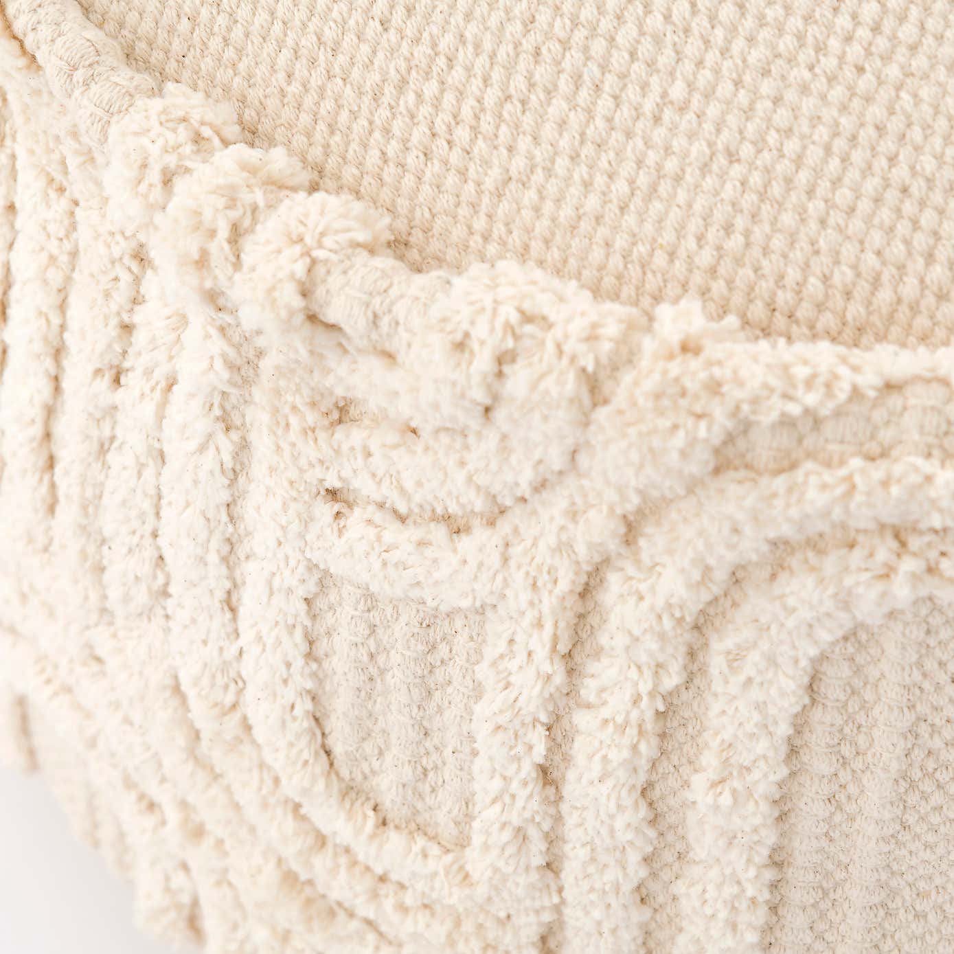 Curves Tufted Natural Pouffe