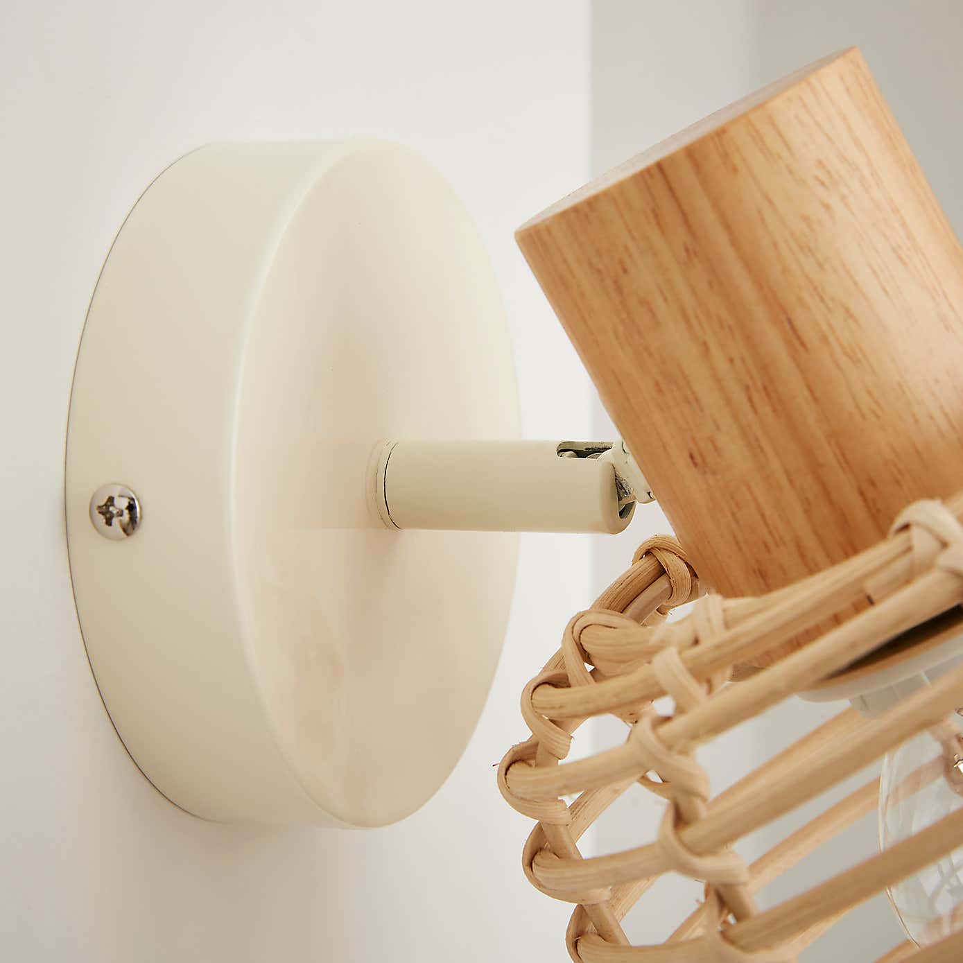 Emil Rattan Adjustable Wall Light