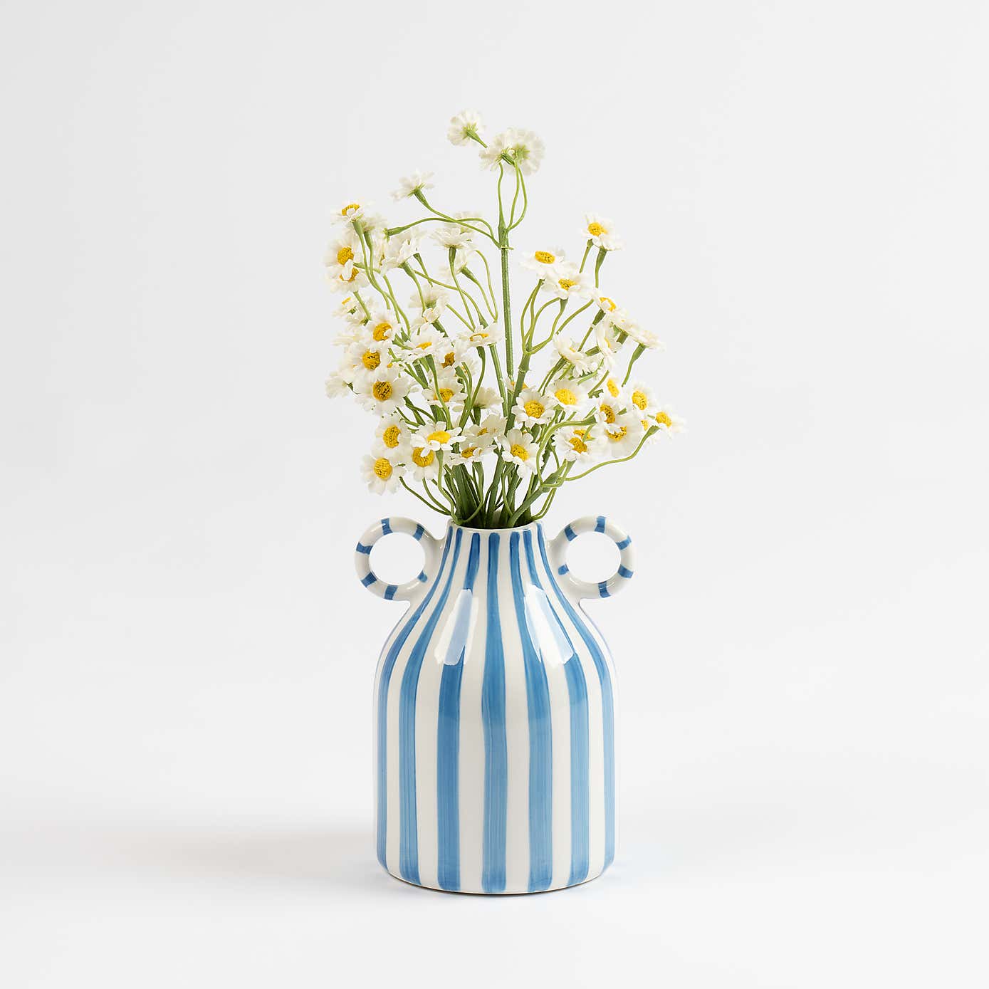 Artificial Daisies in a Ceramic Vase