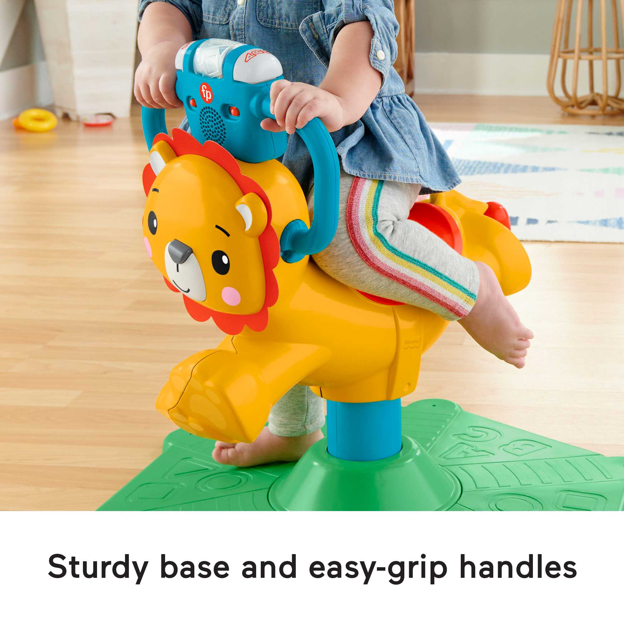 Fisher-Price Bounce & Spin Lion Stationary Ride-On Electronic Learning Toy For Toddlers